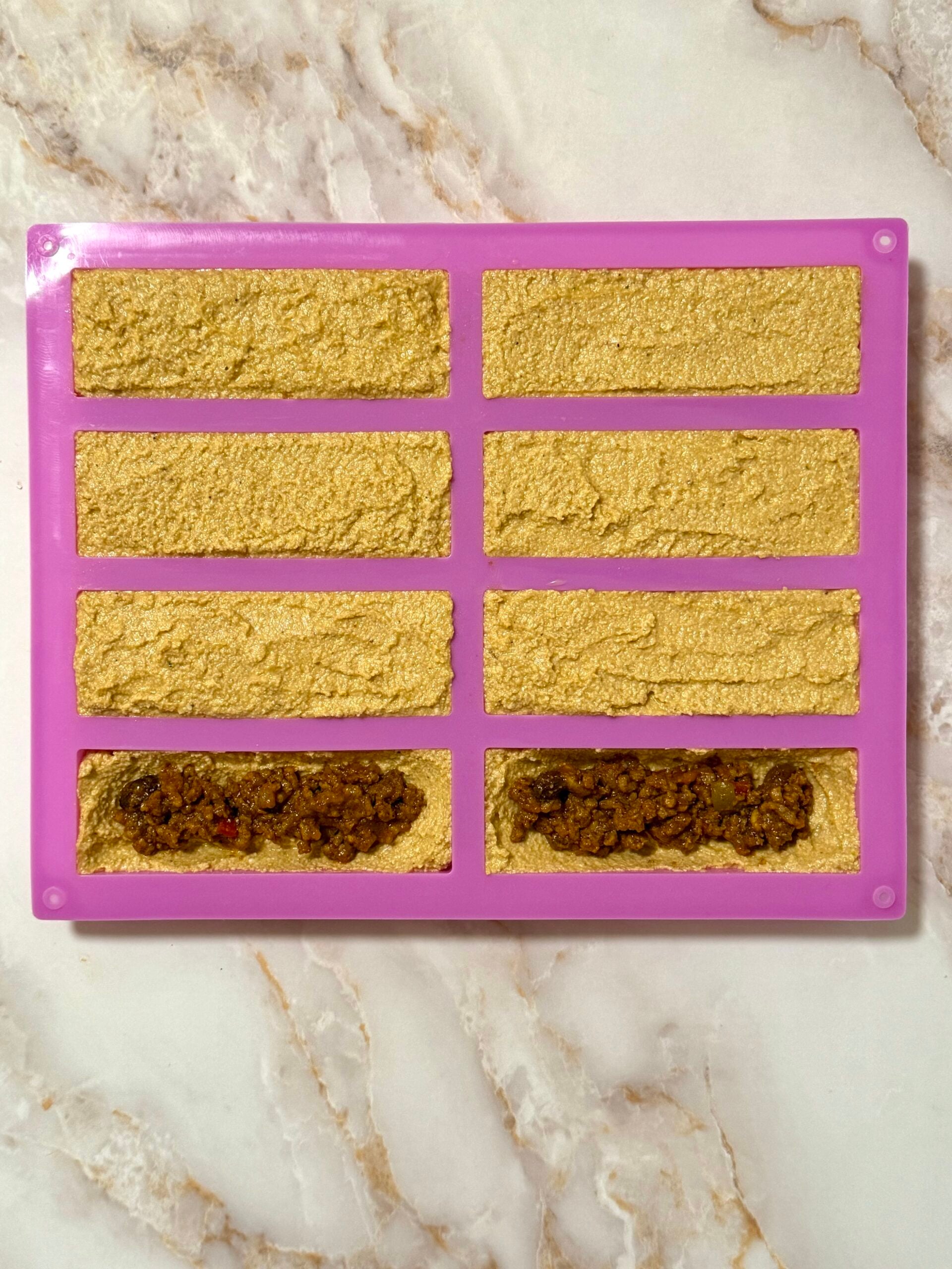 Alcapurrias in silicone mold