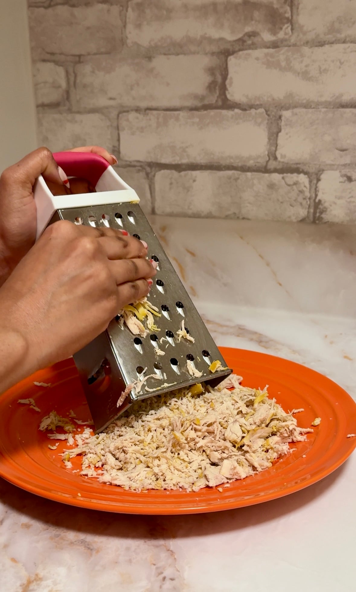 Shredding chicken breast using cheese grater