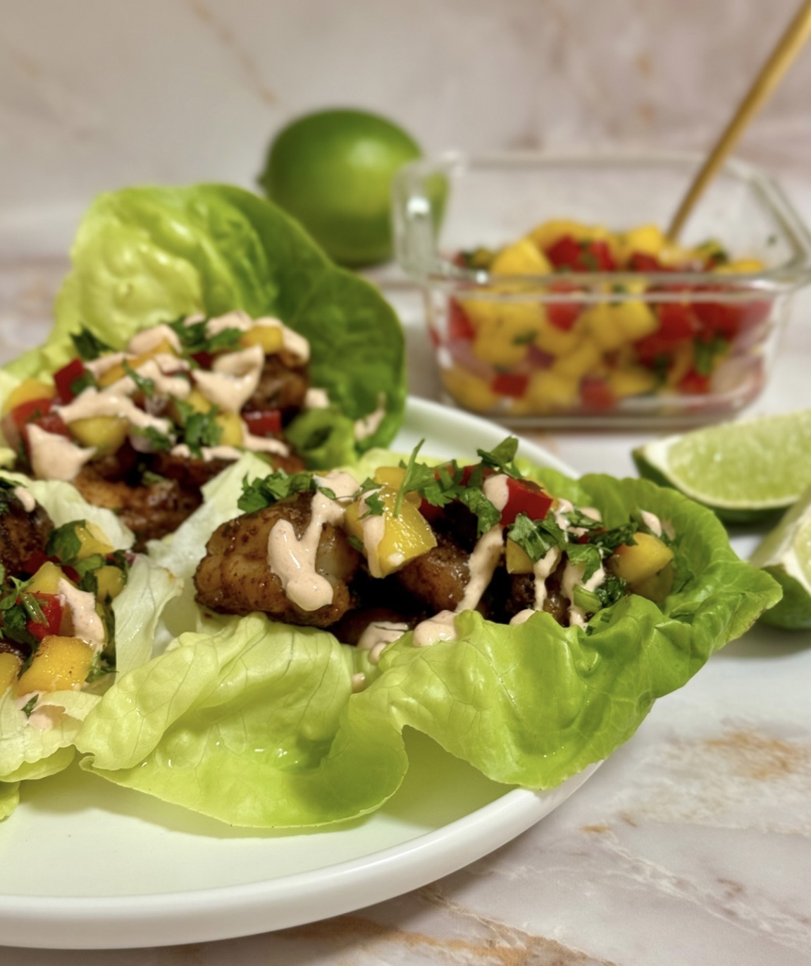 Blackened shrimp with mango salsa lettuce boats