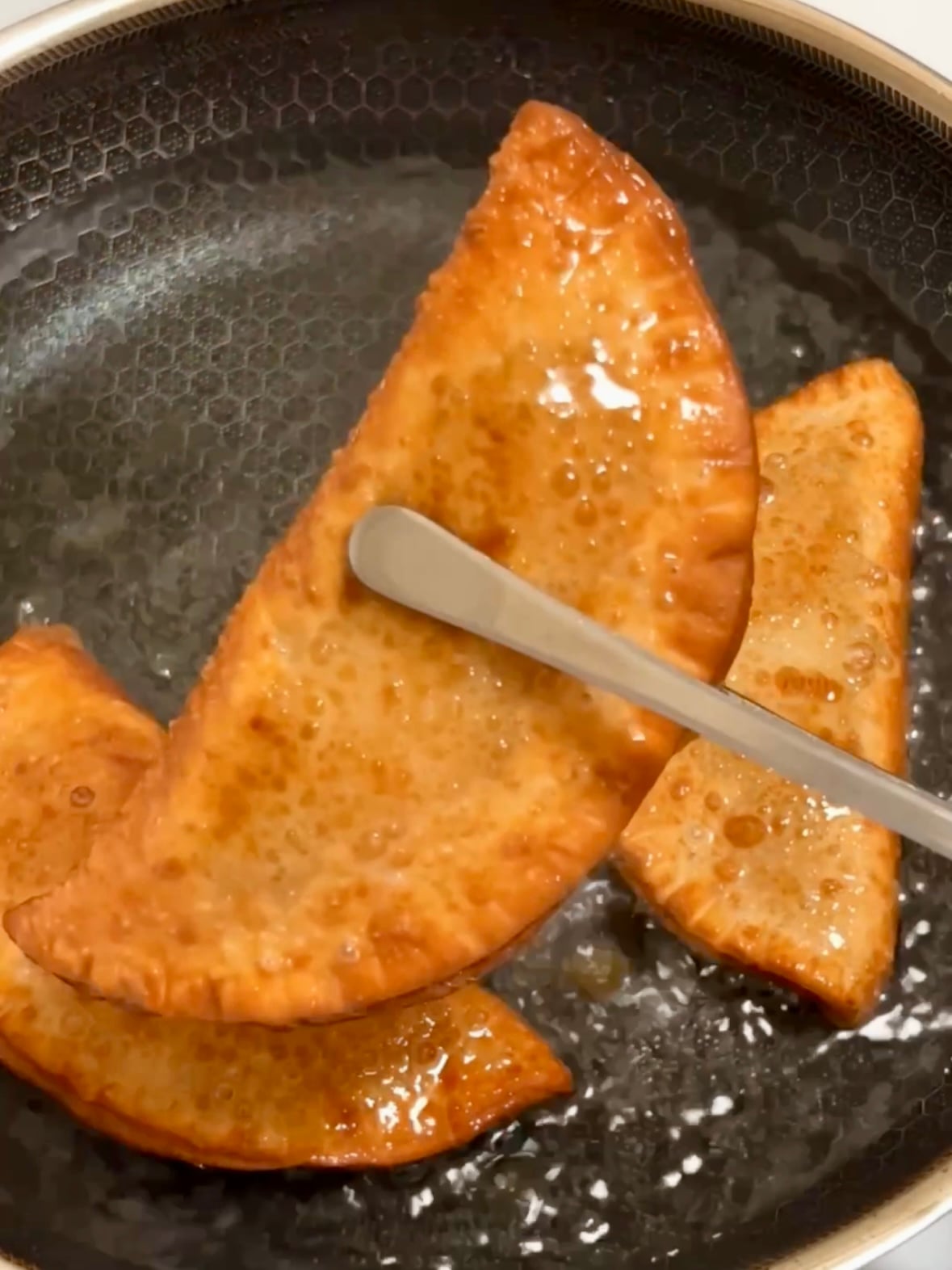 frying empanadillas